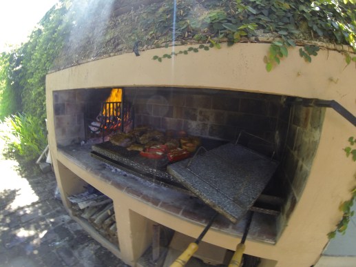 A typical BBQ in Argentina: In the left corner you prepare the coal and the grill grate you can set stepless